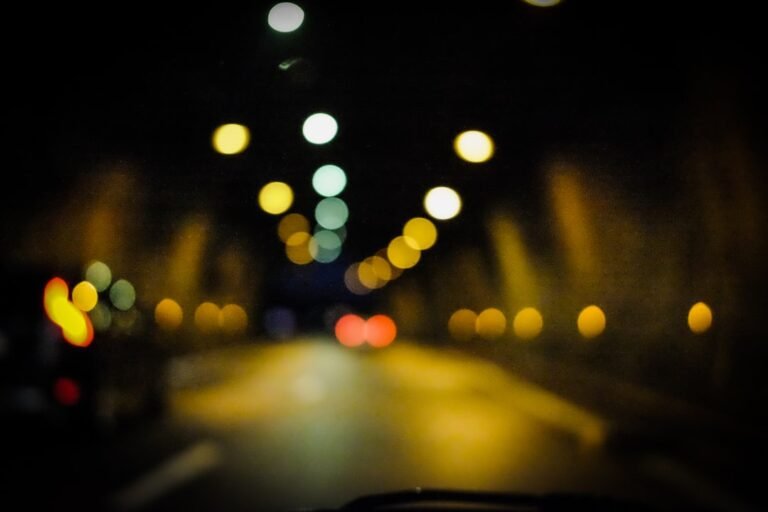 Blurred lights on a dark road at night
