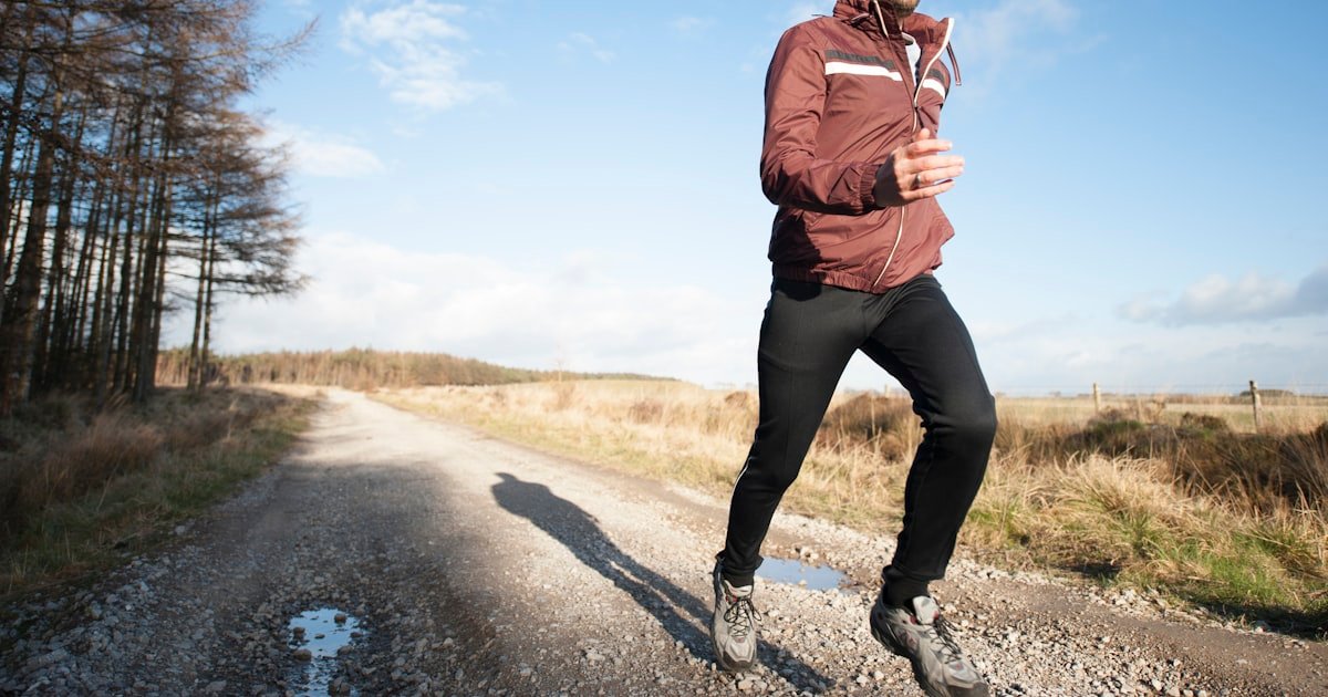 Runner outdoors at daybreak, returning to running after refractive surgery